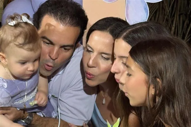 Isabela Rolim e Drauzio Barros Leal assopram a primeira velinha da Celina