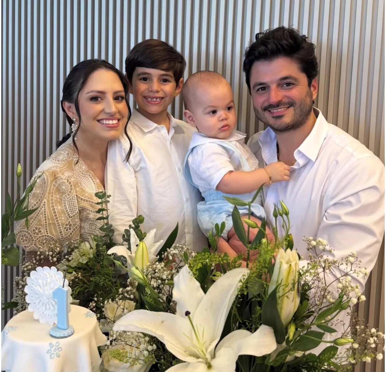 José, filho de Raíssa e Odmar Feitosa Filho, recebe o sacramento do batismo